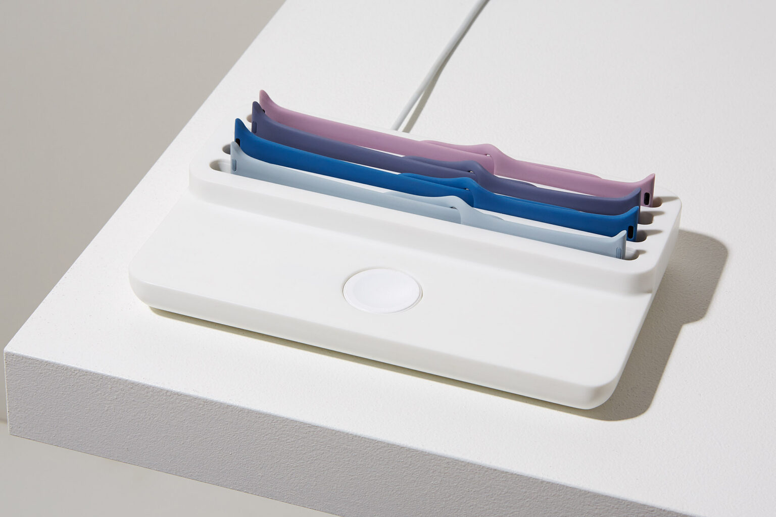 Anden Watch Valet in white with spare straps and the charger opening visible